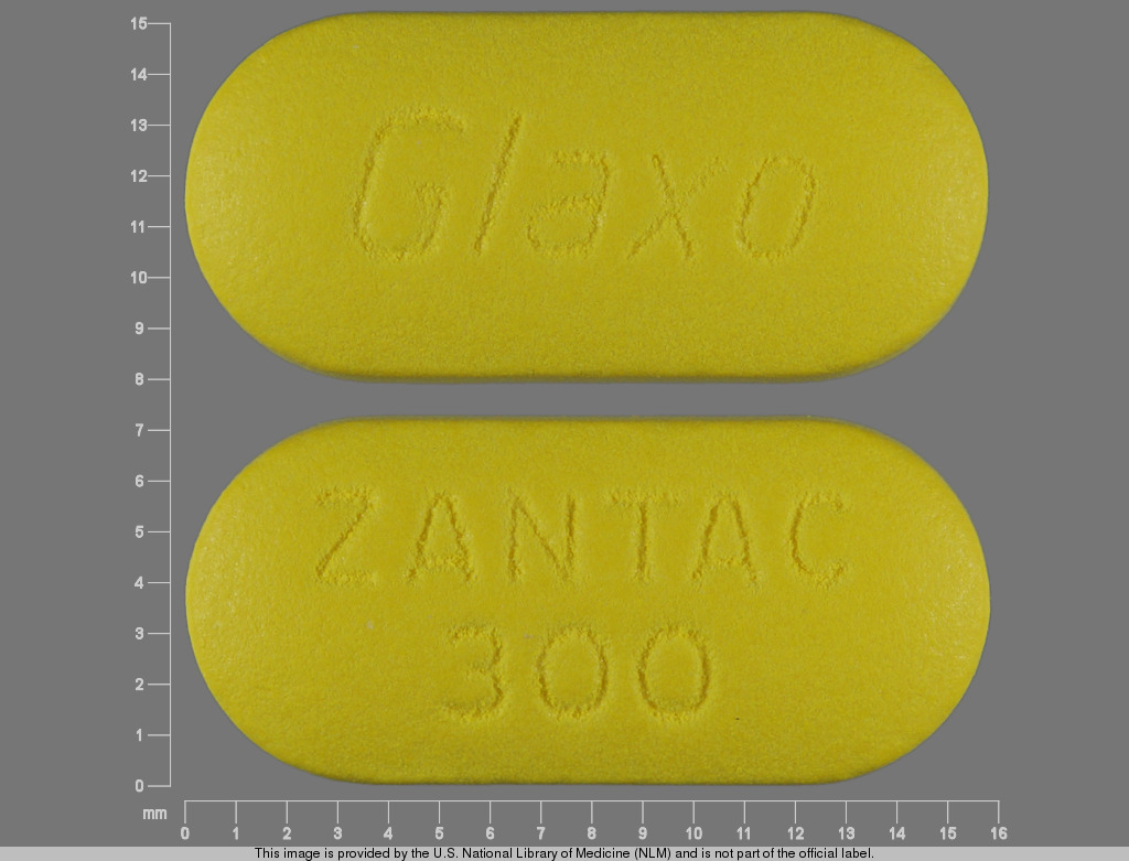 yellow oval Pill with imprint zantac 300 glaxo tablet
